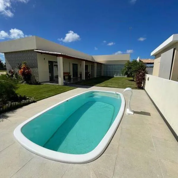 Casa no Villa das Águas com piscina privativa