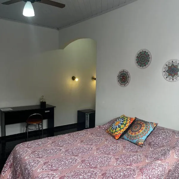 Casa com quarto e suíte